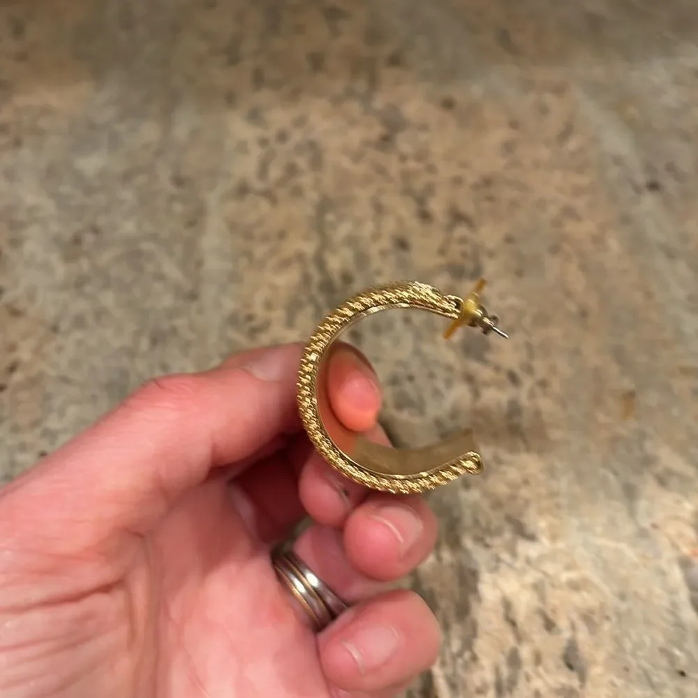 Woman's gold cuff earring. Just one earring